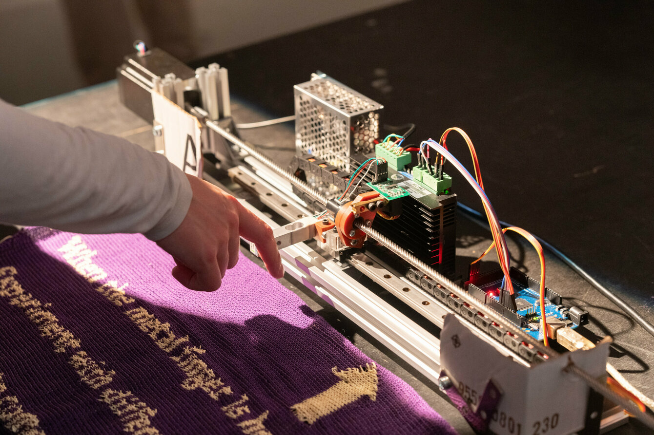 Close-up of a sewing robot, showing the electrical engineering behind it. 